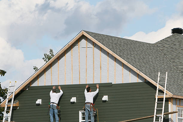 Professional Siding Contractor technician working in Petersburg, IN